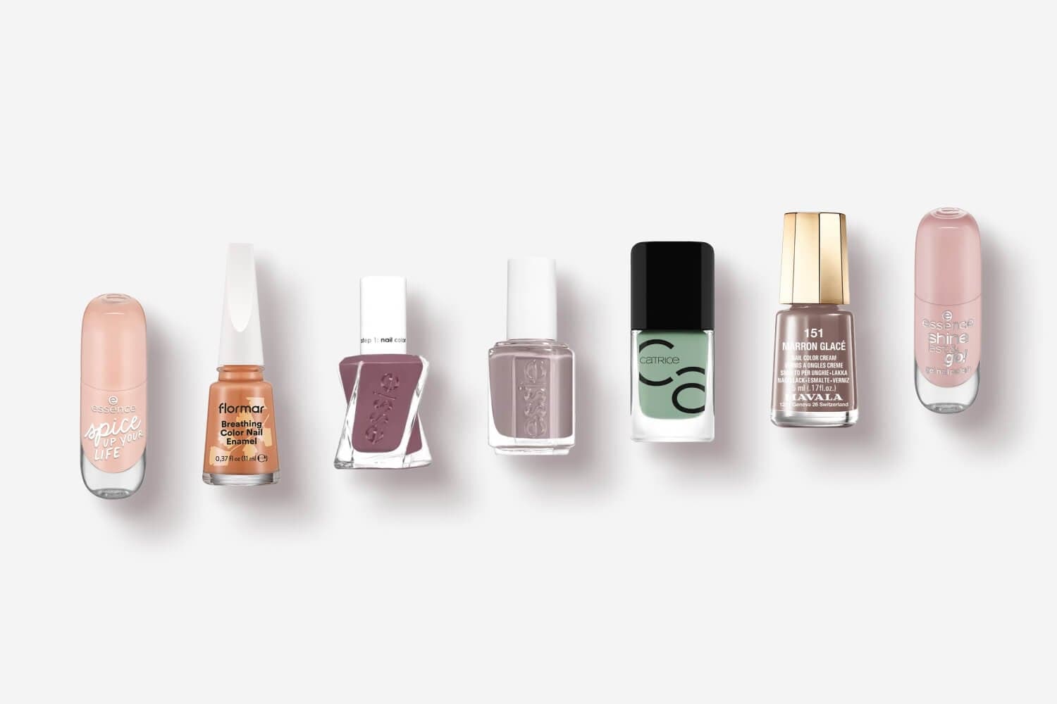 essence Spice Up Your Life, Flormar Breathing Color, two Essie polishes, Catrice, Mavala 151 Marron Glacé and essence Shine Last & Go bottles in a row