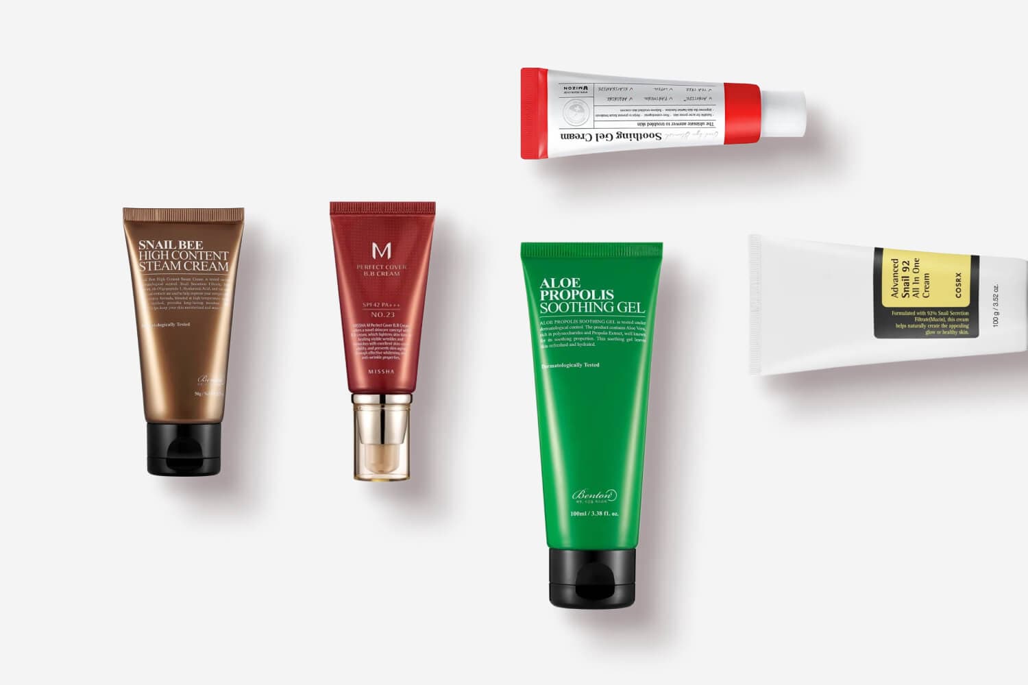 Benton Snail Bee Steam Cream, Missha M Perfect Cover BB No.23, Benton Aloe Propolis Soothing Gel, COSRX Advanced Snail 92 and Soothing Gel Cream tubes.