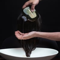 Antipodes شامبو الحجم واللمعان مانوكا + برتقال 340ml